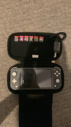 Nintendo Switch Lite + Games, charger and case