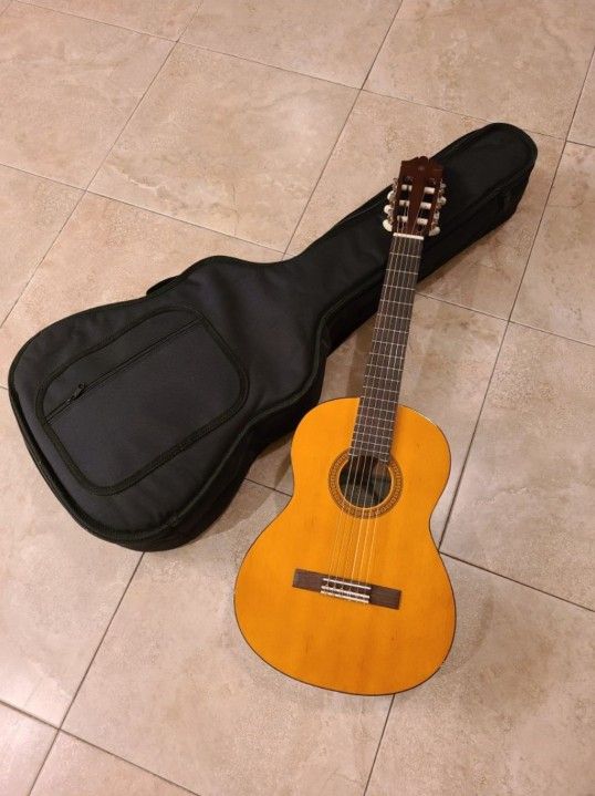Half Size Yahama Guitar + Case
