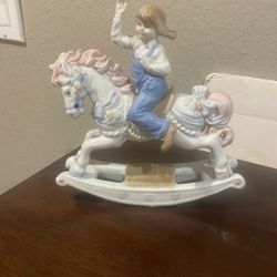 Girl, riding horse porcelain statue, 8 inches tall