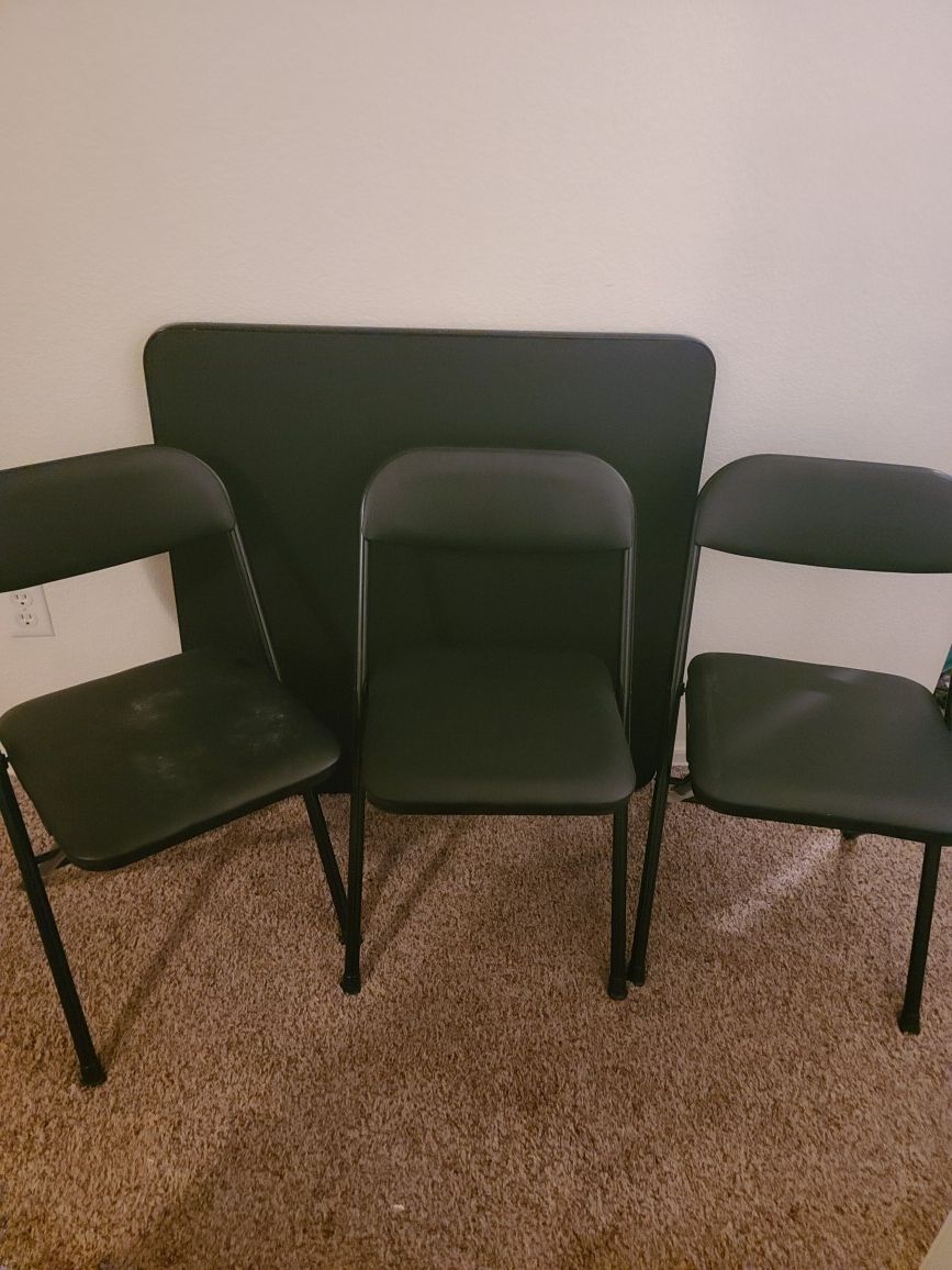 Folding table & 4 chairs