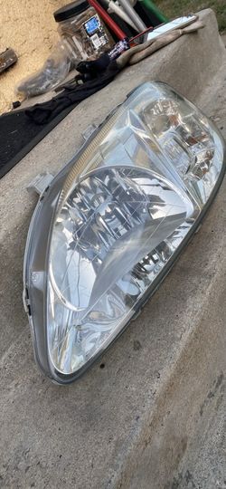 Only one, 1999 Honda Civic OEM headlight left/ driver side
