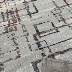 Brio area rug, 8 x 10 ivory, gray rest, blue, and gold accents