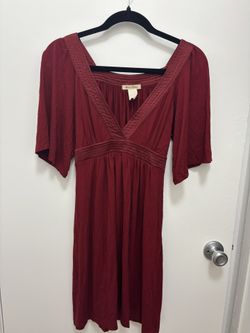 flowy maroon dress with bow in back