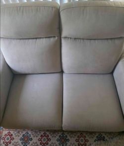 Sofa and love seat with electronic recliner