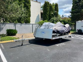 Snowmobiles and trailer