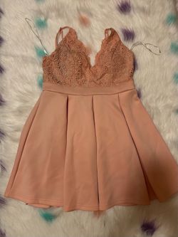 Fitted and flared dress with a peach-papaya lace bodice, size L