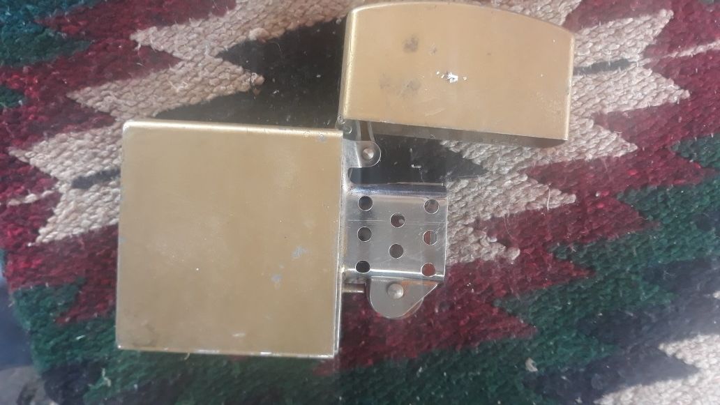 Giant Zippo lighter. Needs some work but every salvageable