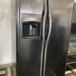 Black Side By Side Refrigerator Made By Frigidaire
