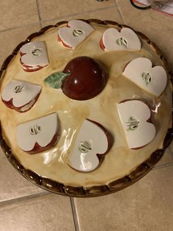 Ceramic pie holder or cookie plate.