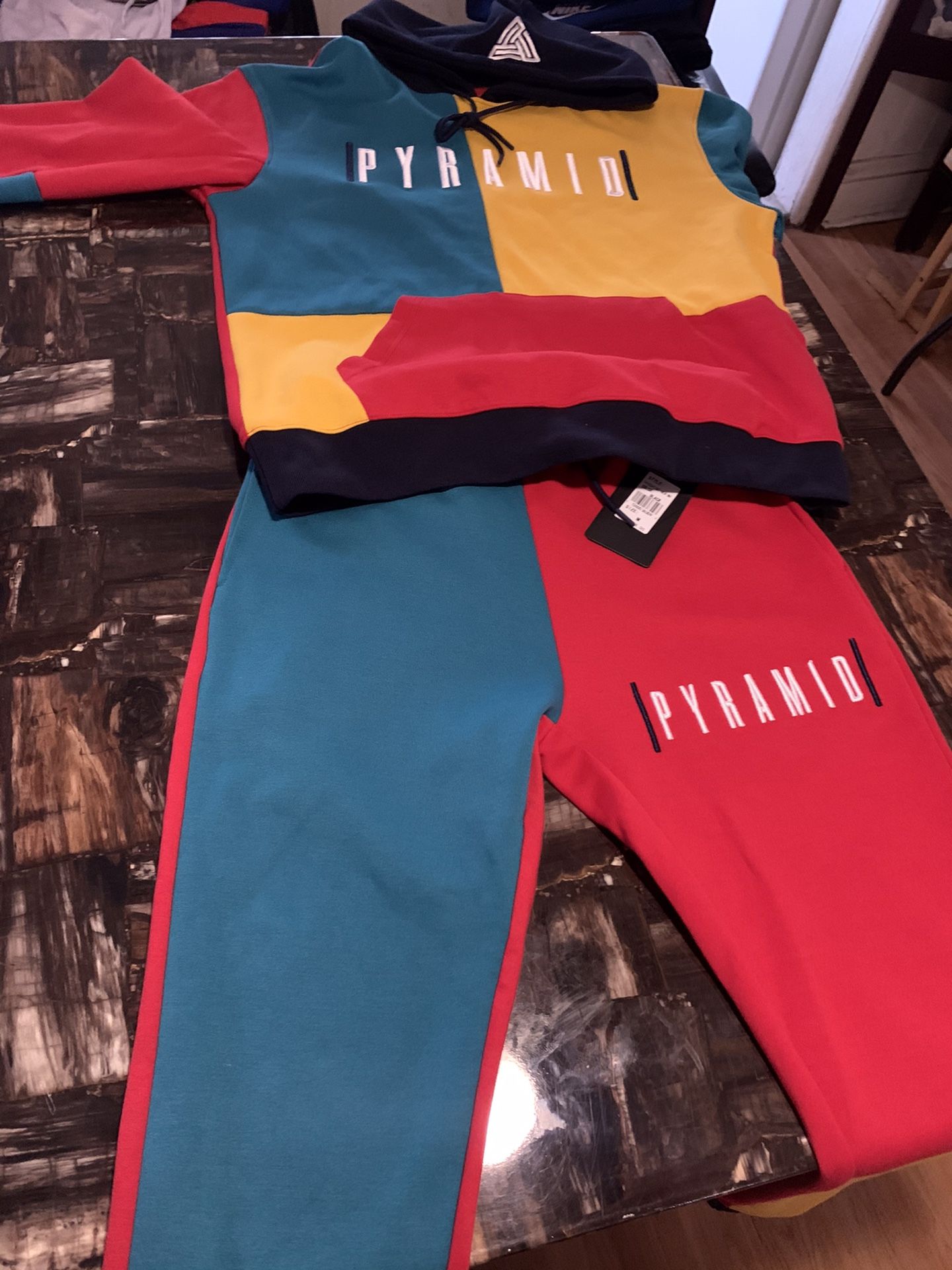 Black pyramid sweat suit