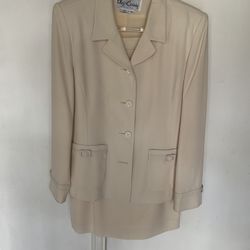 NEW OLEG  CASSINI SKIRT AND BLAZER SET. SIZE 10. SKIRT 27” L. 50 PERCENT ACETATE And 50 PERCENT POLYESTER . LINING 50 PERCENT ACETATE