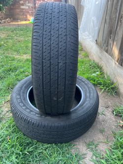 Set of 2 used tire 205/65/16  Firestone  se habla espanol