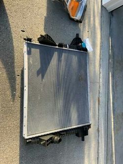 Super duty parts radiator and headlights