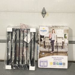 56-74” Regalo gate (new )- 28” height 