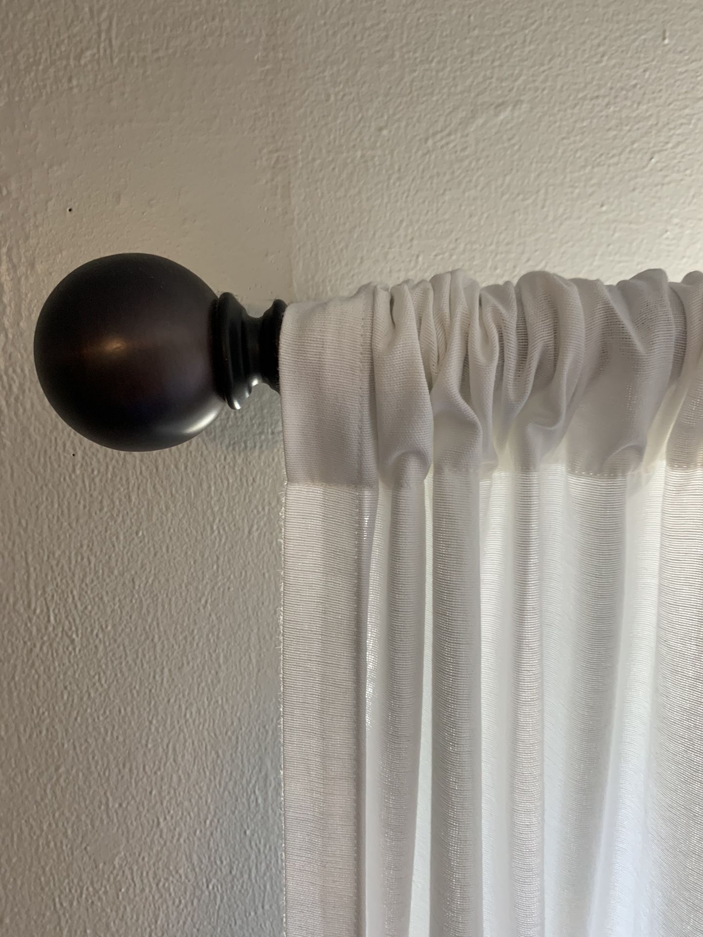 White curtain panels and bronze rod!