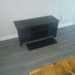 Black Tv Stand Included A Place For Your Keyboard On Bottom