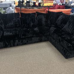 Black Sectional W Ottoman 