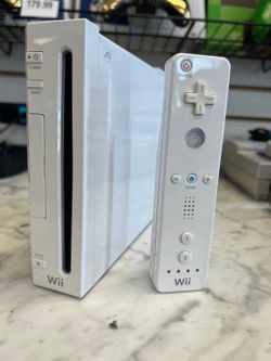 Wii Console + 2  controllers all cords