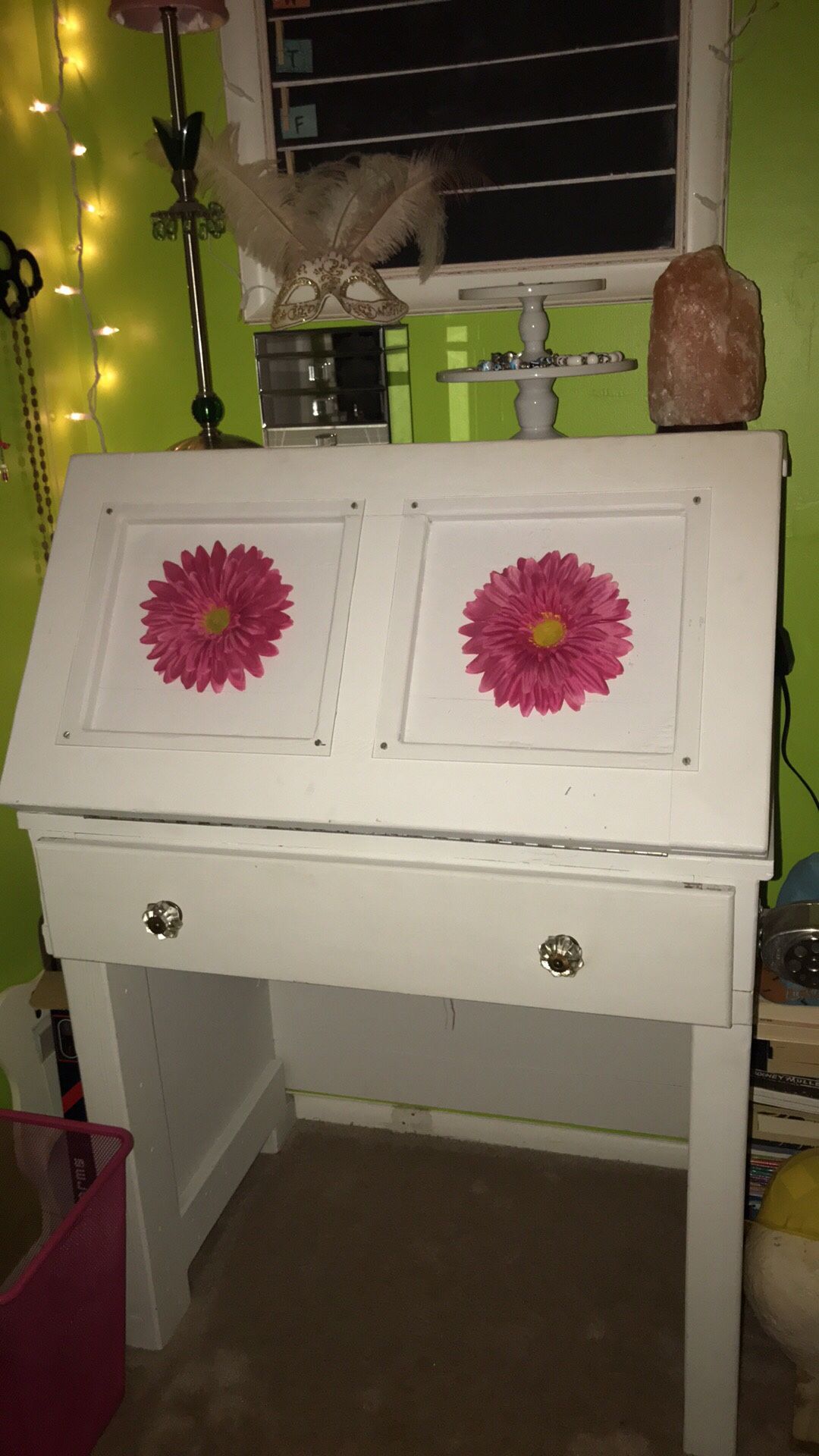 Vintage desk with chair painted with pink flowers, newly renovated pink fabric on chairs.