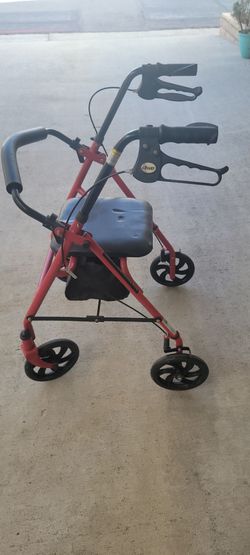 RED DRIVE WALKER IN GOOD CONDITION ONE LITTLE TEAR ON SEAT SEE PICTURES