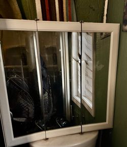 Large 3 Panel Mirrored Medicine Chest.