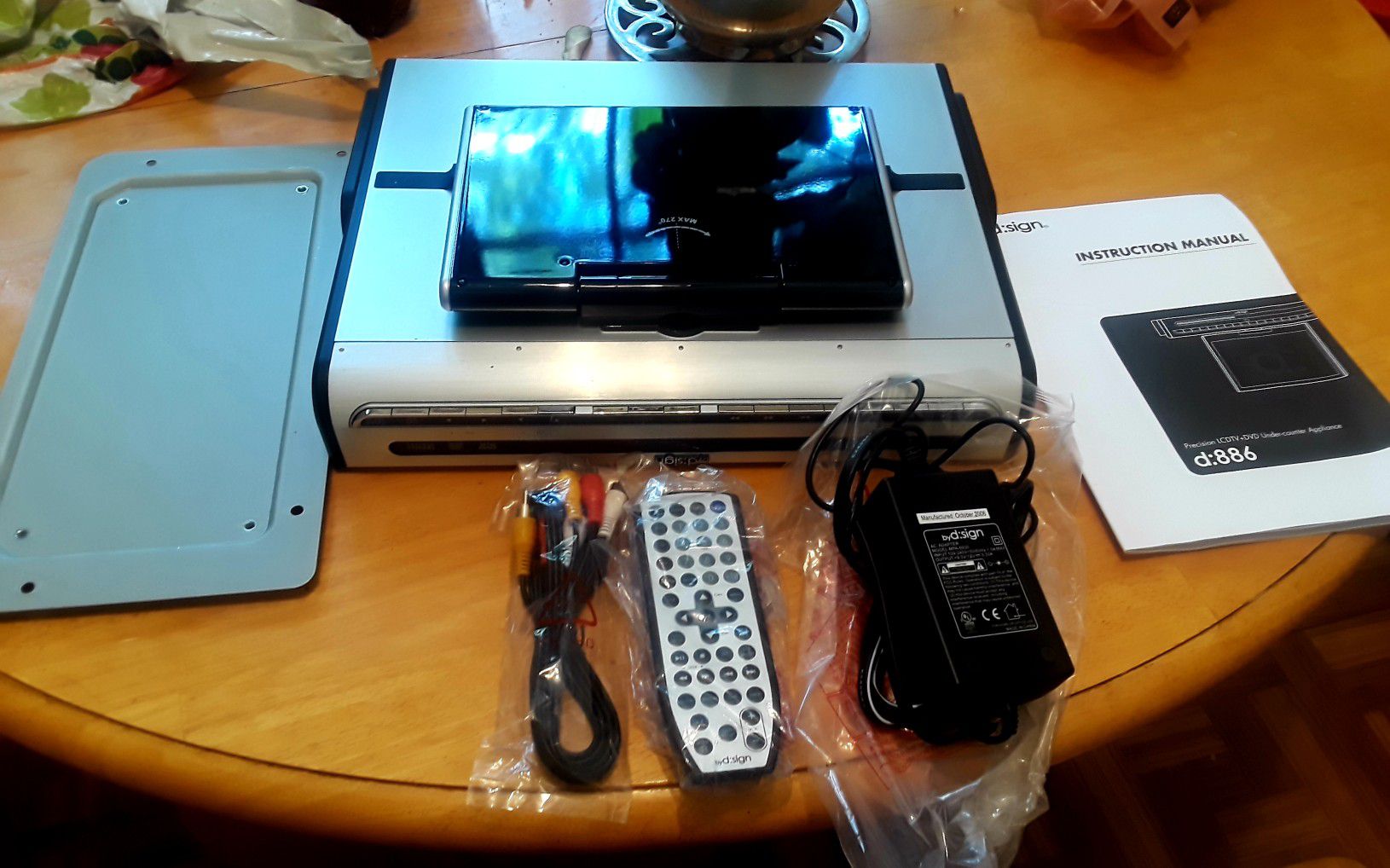 FREE. Under cabinet or counter. DVD player. D:Sign
