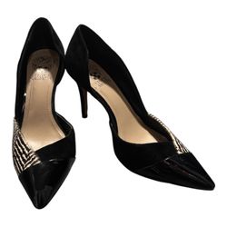 Tammie pumps from Vince Camuto feature a black patent leather capped toe with a d'Orsay cutout. Zebra print portion is made of calf hair. Black suede 