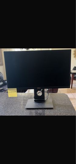 Black and grey hp computer monitor