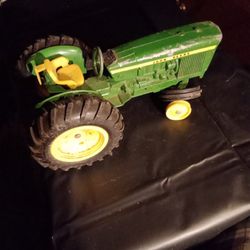 John Deere Tractor Needs Front Tire.Vintage.