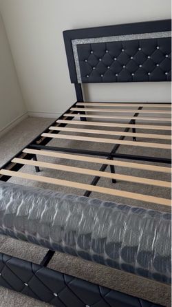 Black Tufted Upholstered Bed Frame and Mattress