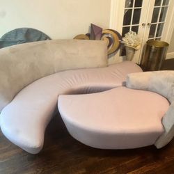 2 piece Ostrich leather couch with swivel chase and wall piece set and Wall Piece
