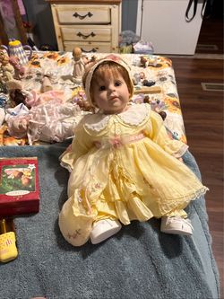 Porcelain Baby Doll in Yellow Dress