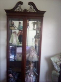 Wooden Doll Or China Cabinit