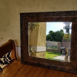 Beautiful artisan engraved metal mirror