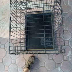 Medium-sized dog cage.