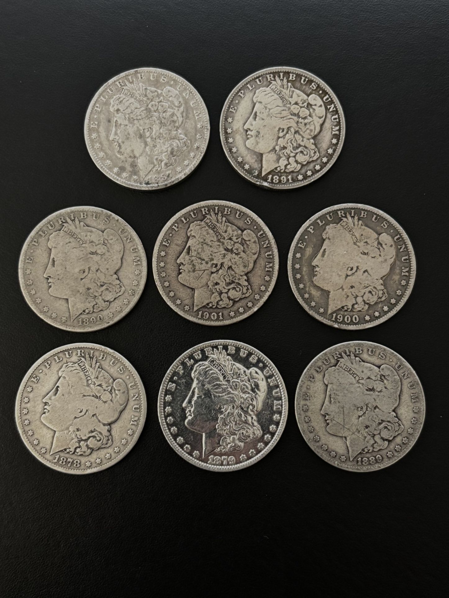 (8) Morgan Silver Dollars