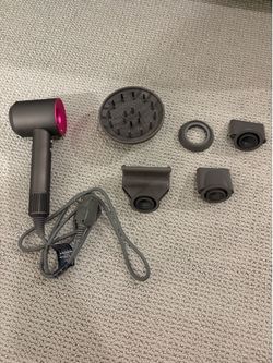Dyson supersonic. Includes all the attachments