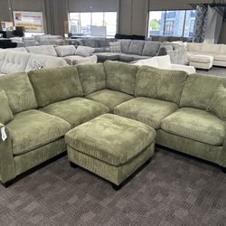 Green Sectional And Ottoman 