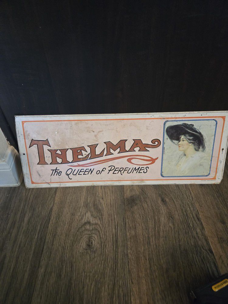 Vintage Thelma Queen Of Perfumes Tin Sign