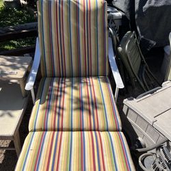Lounge chair, metal frame, and cushion