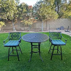 Patio set. Hi top. All metal. Swivel chairs and table. Nice.