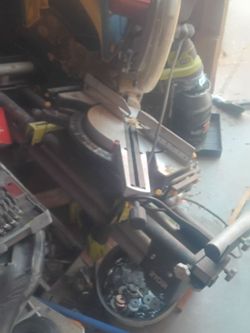 Harbor freight 12'' miter saw with a  DeWalt stand.