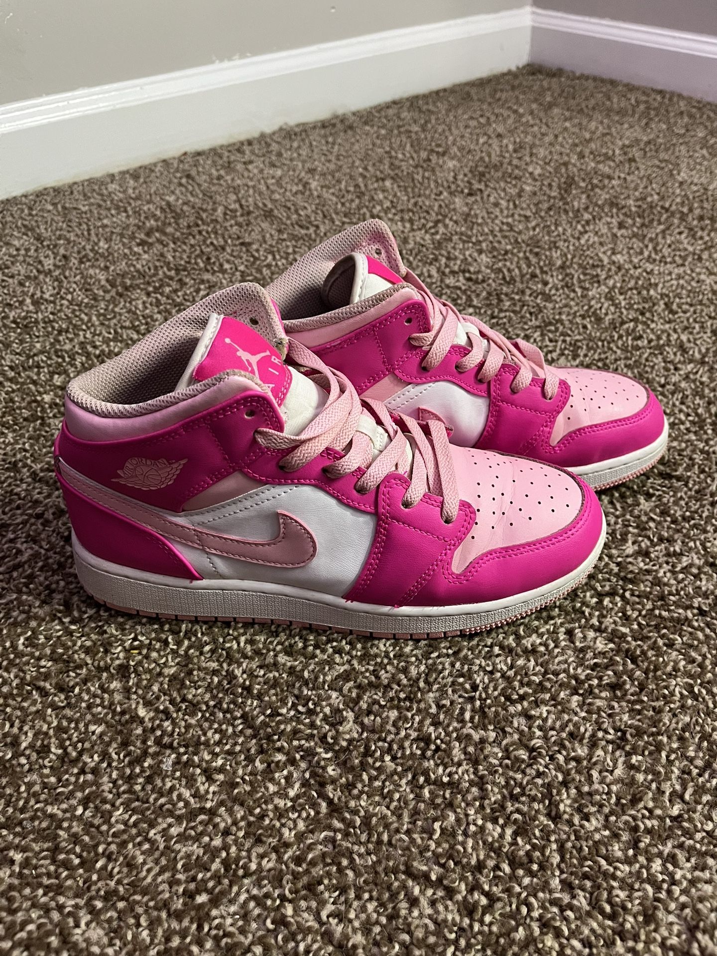 mid top air jordan 1s pink & white size 6Y