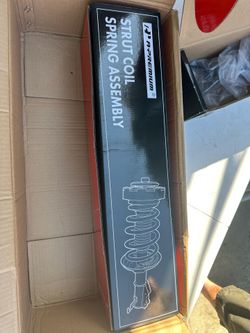 Strut coil spring assembly for suspension