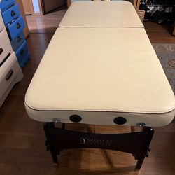 Massage table