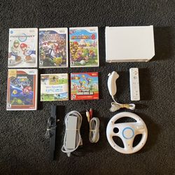 Nintendo WII Bundle With 6 Games Mario Kart,Mario Party,Wii sports, Smash Bros. Mario Galaxy, Super Mario Bros.