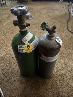 Compressed Oxygen Gas and Acetylene tanks