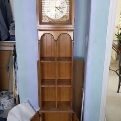 Antique Butler bookshelf with clock