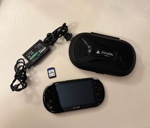Ps Vita 2000 with case & Madden 13