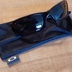 Oakley Sunglasses Color Black...NEW with bag Case!...$25